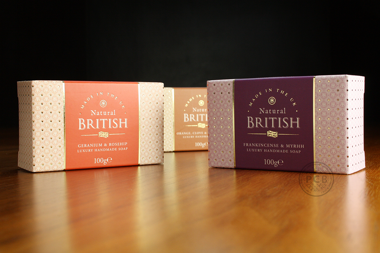 Close-up of three luxurious-looking soap cartons.
