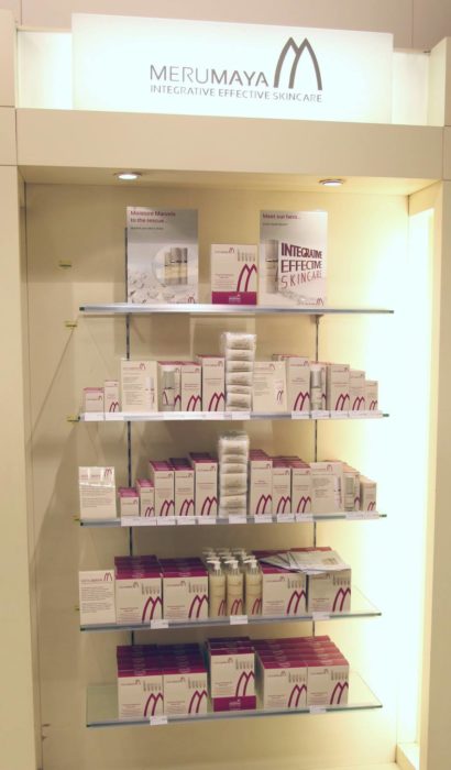 In-store shelved display of range of Merumaya's products with packaging graphics by Paul Cartwright Branding.